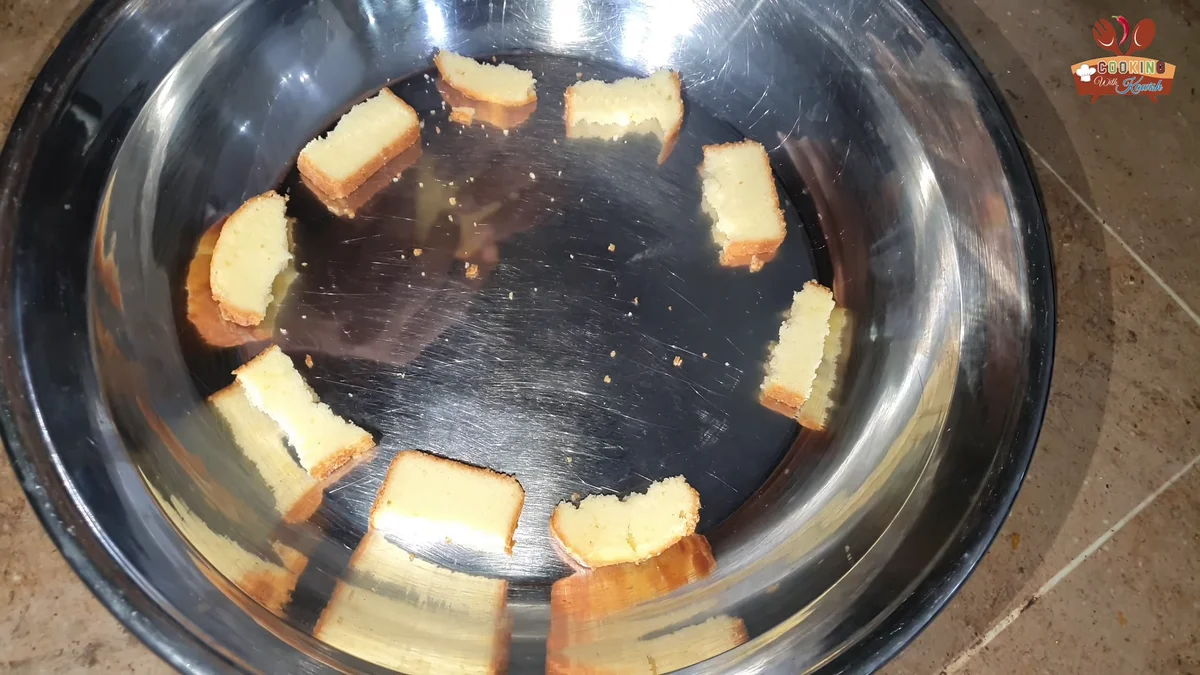 Cake pieces arranged in the bottom of a glass bowl