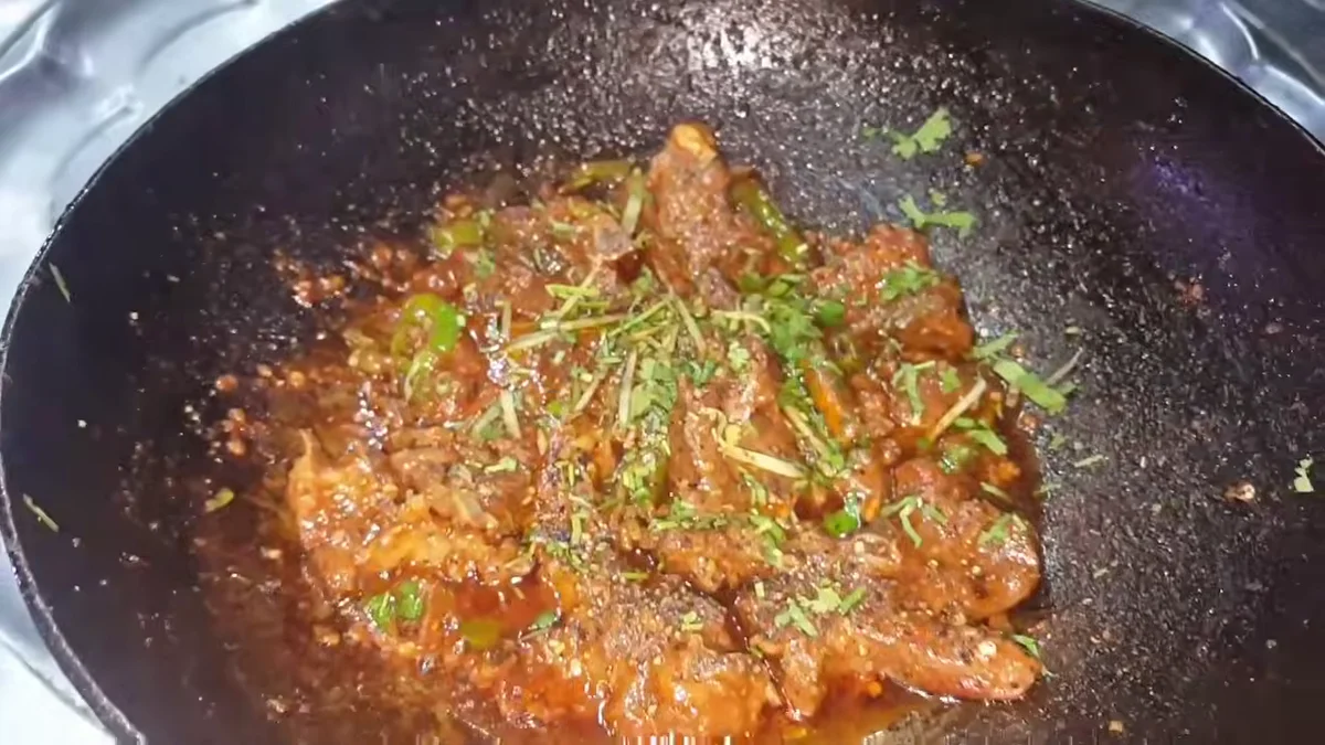 Shinwari mutton karahi with ginger and coriander on top