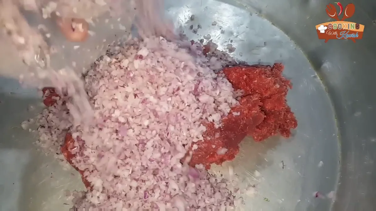 Chopped onion added over the meat