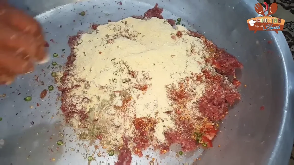 Corn flour sprinkled over the meat mixture
