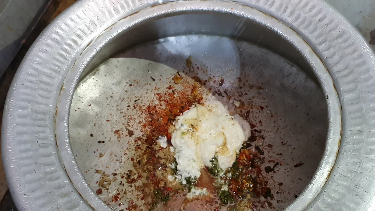 Yogurt added to the spice mix in the deg