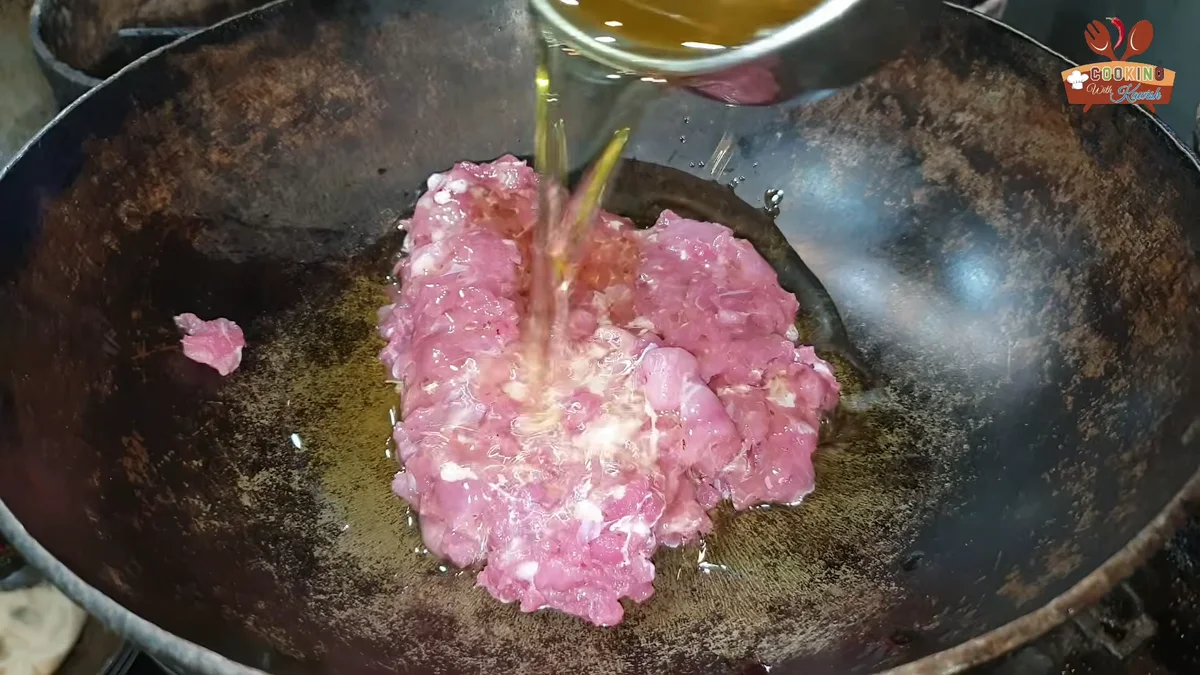 Oil poured over the mutton keema