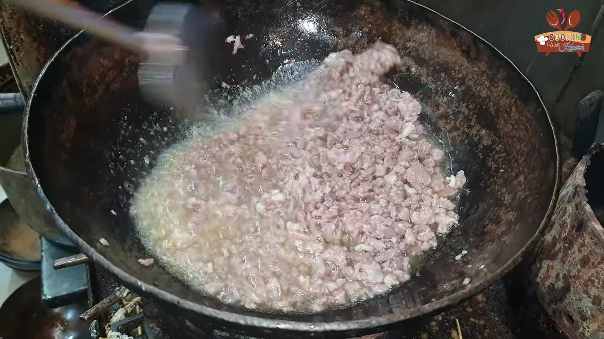 Mutton keema frying until it changes colour