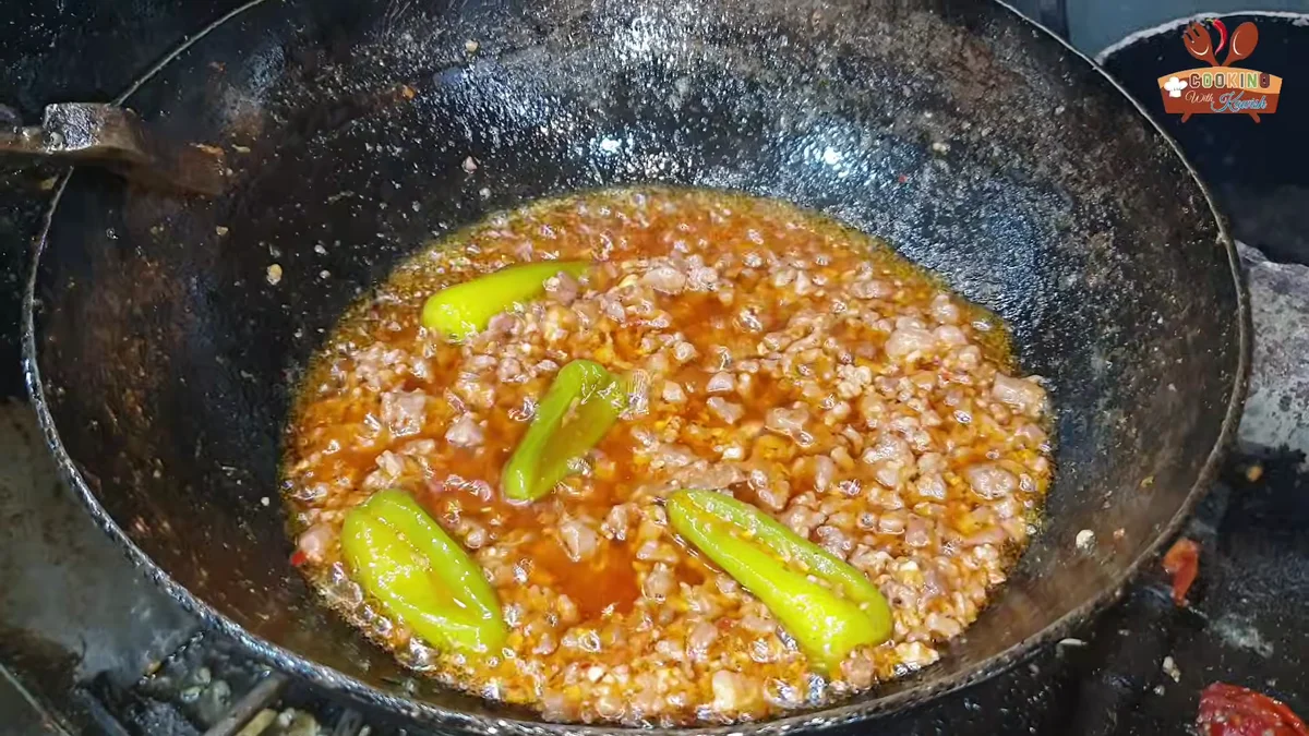 Mutton keema karahi with green chillies cooking down