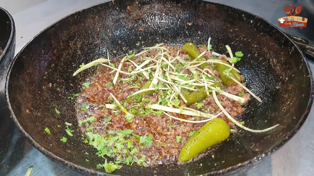 Ginger julienne and fresh coriander on the finished keema karahi