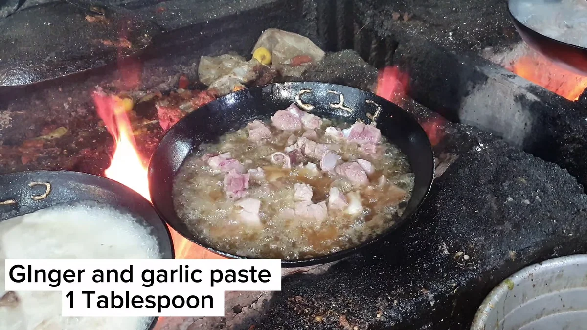 Ginger garlic paste added to the mutton in the karahi