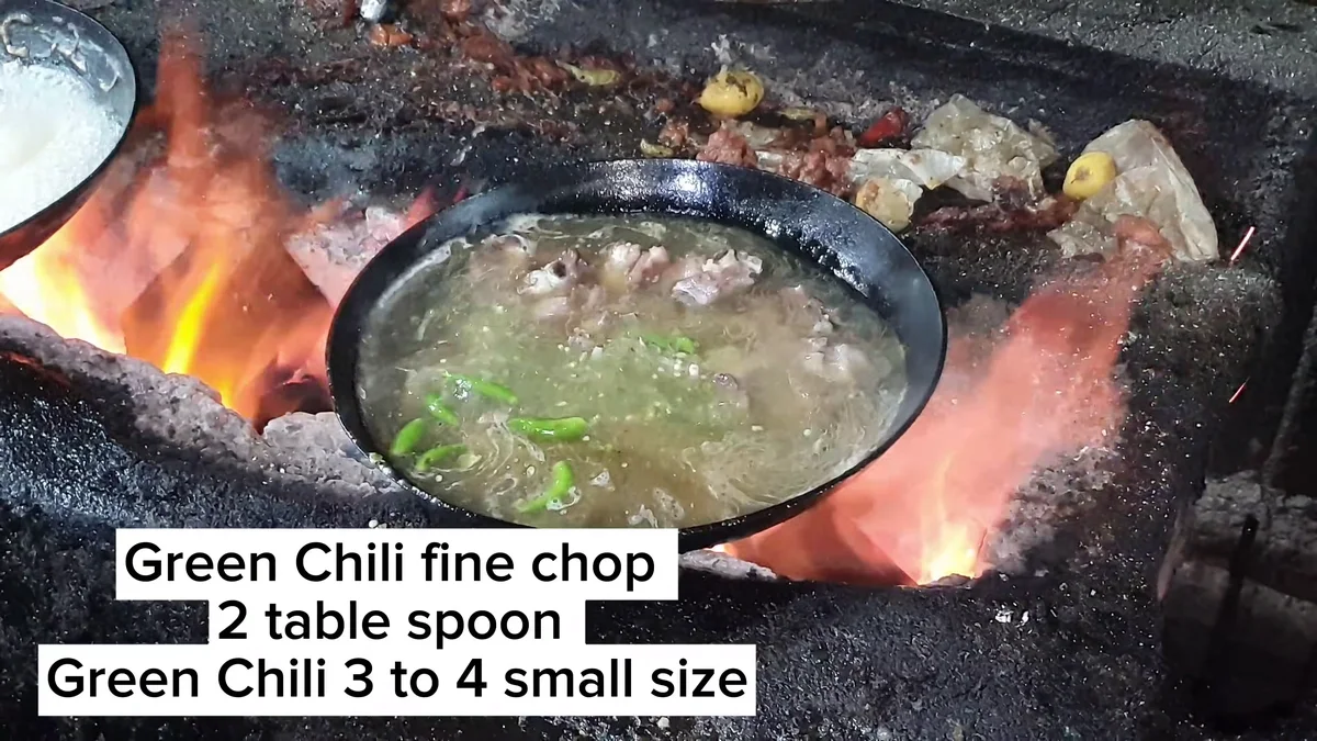 Chopped green chilli added to the Barohi karahi