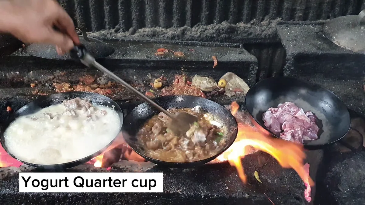 Yogurt being added to the karahi