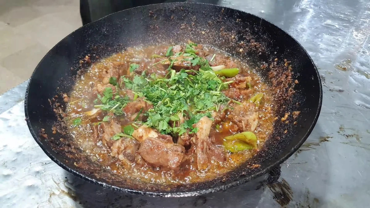 Finished Barohi mutton karahi with coriander and green chillies