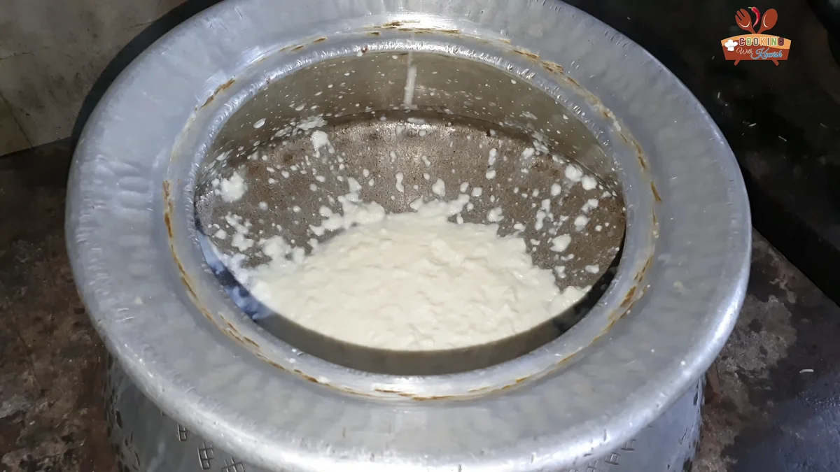 Yogurt in a large deg before it is whisked