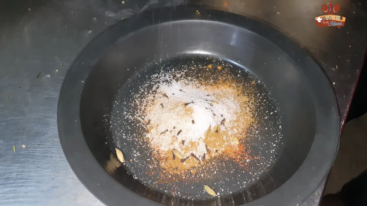 Salt and whole spices added to the masala