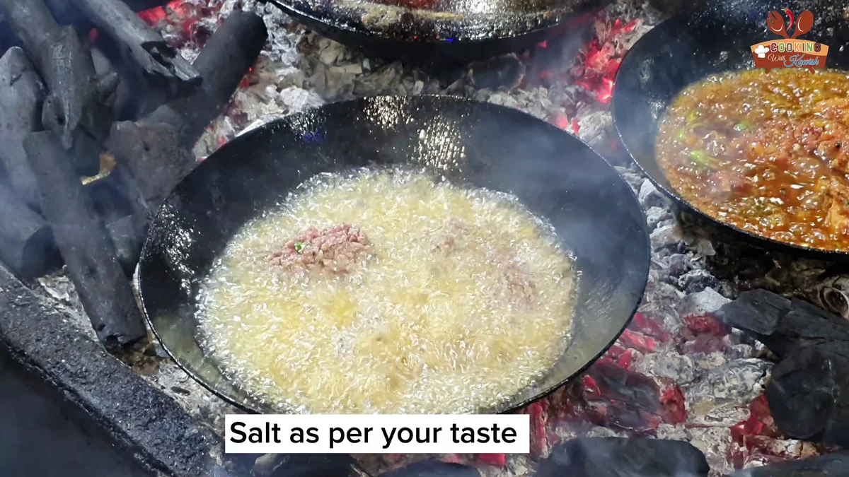 Salt added to the mince in the karahi
