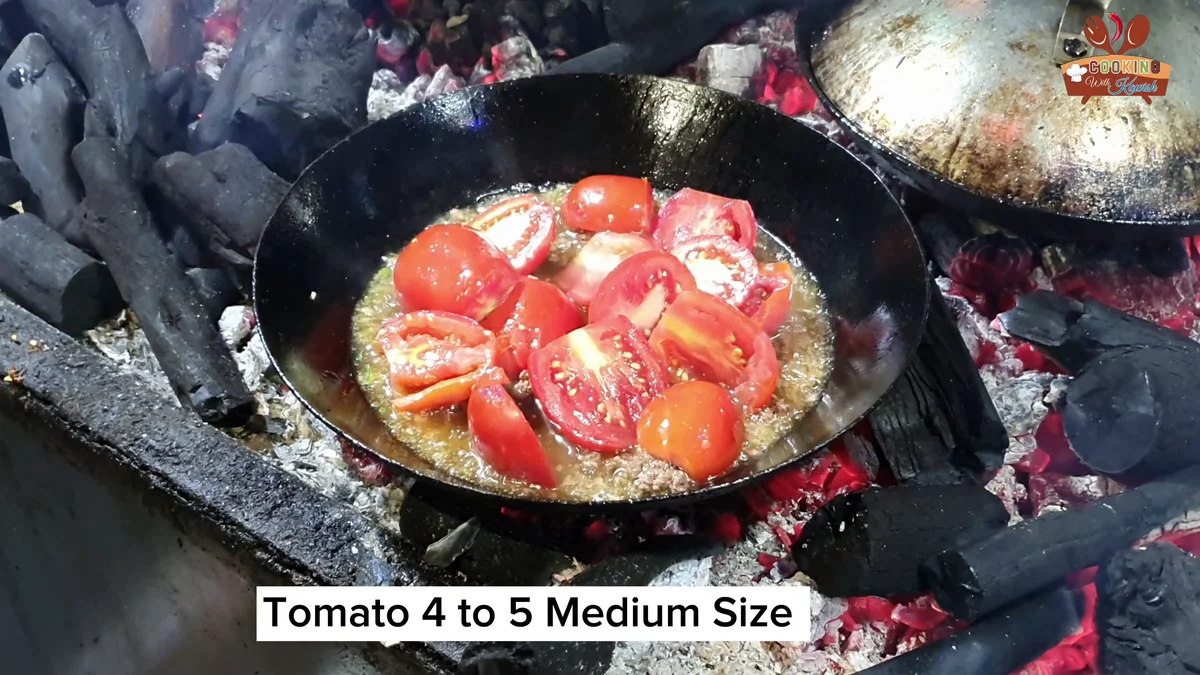Four to five halved tomatoes added over the mince