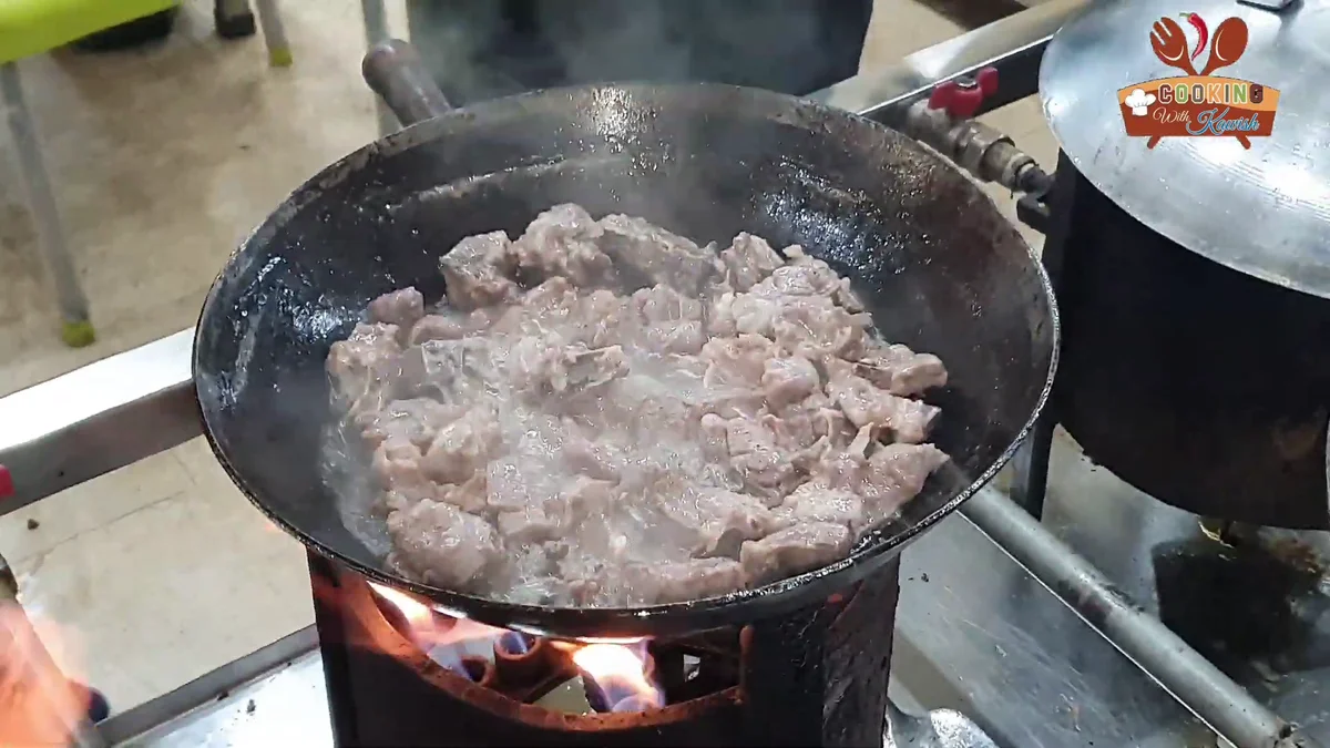 Braised mutton in the karahi once the water has reduced