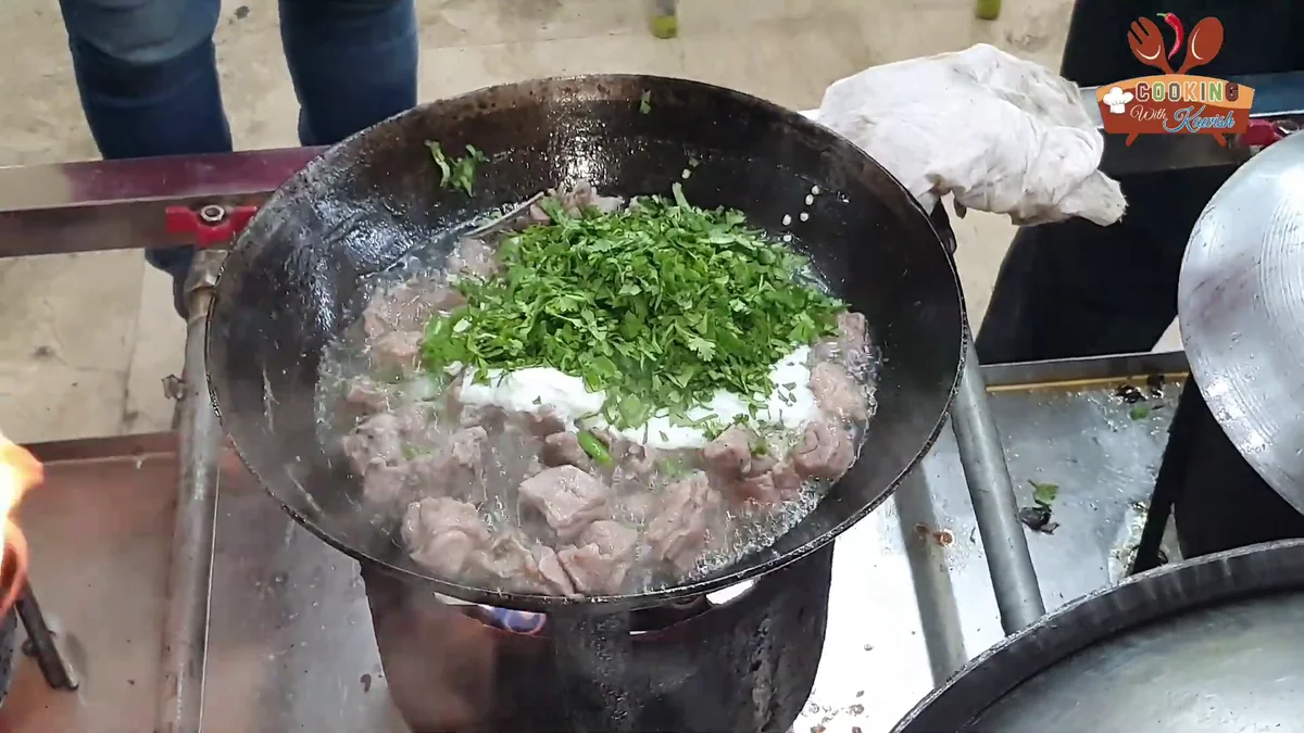 Chopped fresh coriander added over the mutton